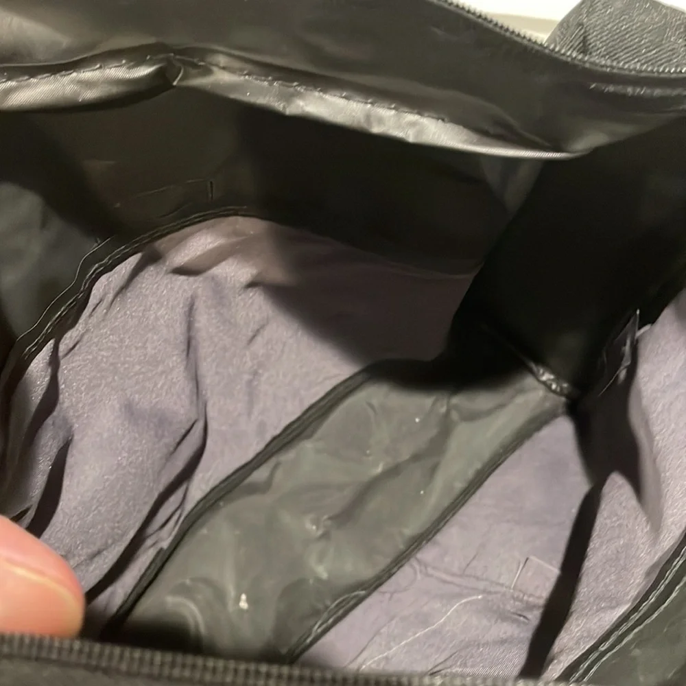 Black and grey canvas messenger bag. NWT